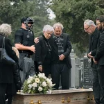 Man Came To Funeral Straight From Work