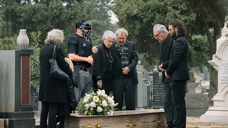 Man Came To Funeral Straight From Work