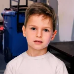Boy Gets Nice Long Look At Small Of Father’s Back While He Picks Up Ping-Pong Ball